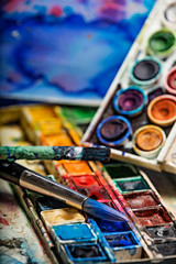 watercolors and paintbrush - art still life