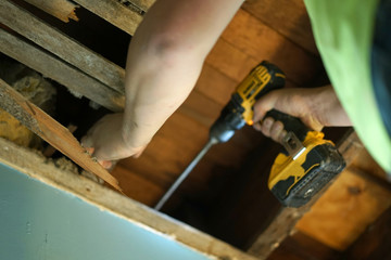 Making a hole in ceiling.