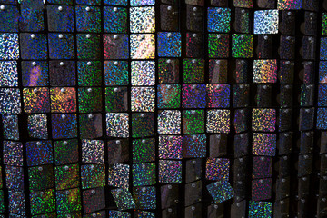 A mosaic texture of symmetrical square sequins