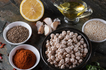chickpeas hummus Ingredients and smoked paprika and caraway and sesame seeds