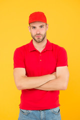 First job as barista. serious guy cashier uniform. Restaurant cafe staff vacancy. man delivery service yellow background. friendly sale assistant. best order deliveryman. successful shopping concept