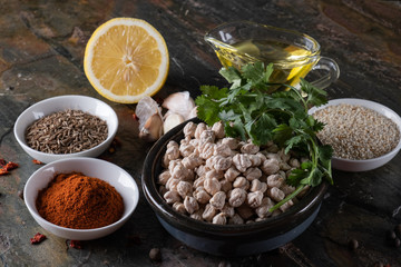 chickpeas hummus Ingredients and smoked paprika and caraway and sesame seeds