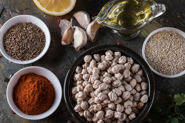chickpeas hummus Ingredients and smoked paprika and caraway and sesame seeds