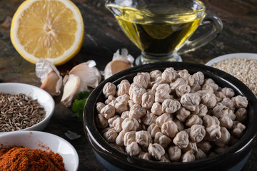 chickpeas hummus Ingredients and smoked paprika and caraway and sesame seeds