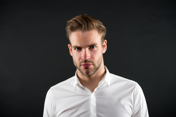 Fototapeta premium Hair style that suits his face. Handsome man with blond hair. Young guy with stylish beard and mustache hair. Personal grooming. Barbershop. Beard barber. Hair salon. Hairdressing and hairstyling