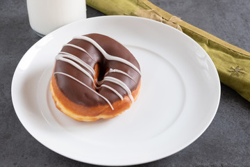 brown iced ring doughnut