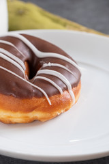 brown iced ring doughnut