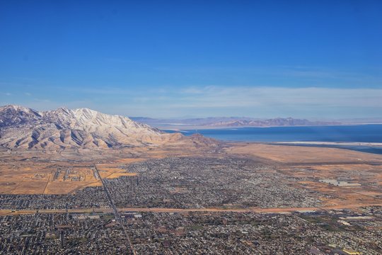 Rocky Mountains, Oquirrh range aerial views, Wasatch Front Rock from airplane. South Jordan, West Valley, Magna and Herriman, by the Great Salt Lake Utah. United States of America. USA.