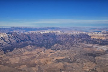 Rocky Mountains, Oquirrh range aerial views, Wasatch Front Rock from airplane. South Jordan, West Valley, Magna and Herriman, by the Great Salt Lake Utah. United States of America. USA.