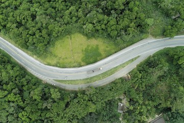 Aerial view of famous Padre Manoel da Nobrega's Road in the saw. Great landscape between mountains. Serra do Mar's State Park, São Paulo, Brazil