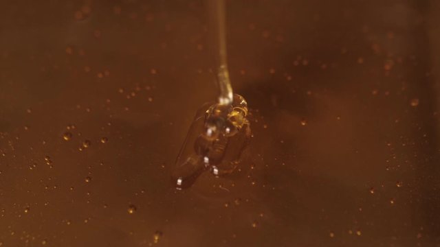 pouring sweet honey slow motion