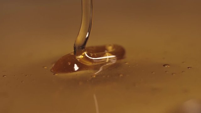 pouring sweet honey slow motion