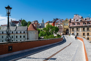 Fototapeta na wymiar Street leading into the Old Town of Lublin, Poland
