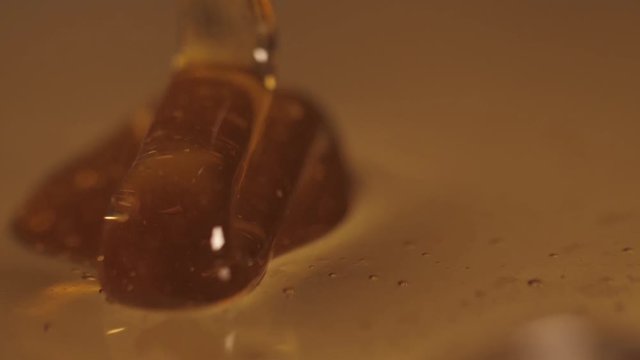 pouring sweet honey slow motion