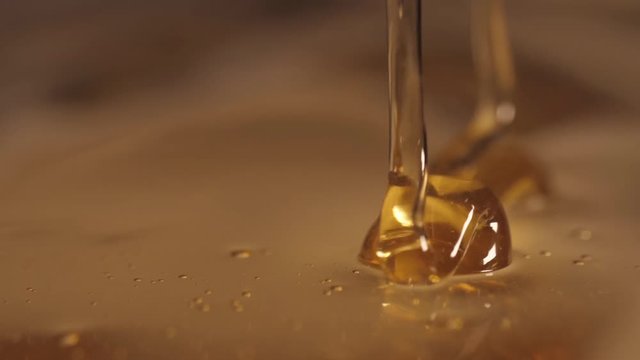 pouring sweet honey slow motion