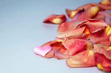 hearts on a background of rose petals. Valentine's Day