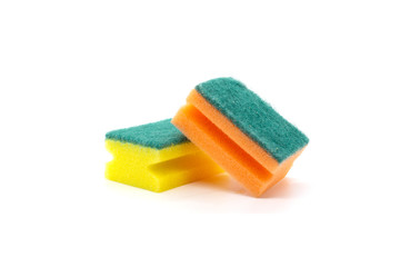 Two multi-colored sponges for washing dishes on a white background