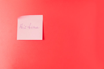 Paper sticker with inscription on red background