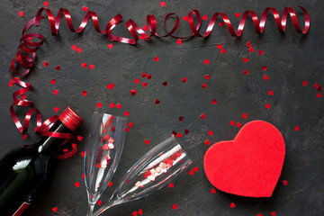 Valentines day background with  glasses, wine  bottle  and hearts