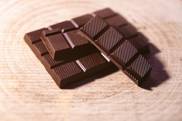 hand made chocolate pieces on wood