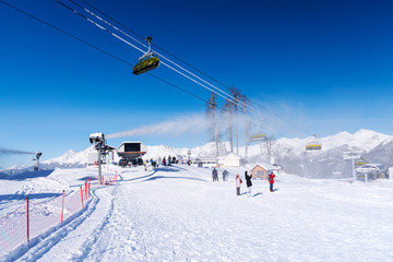 Fototapeta na wymiar snow mountain glade with ski lifts