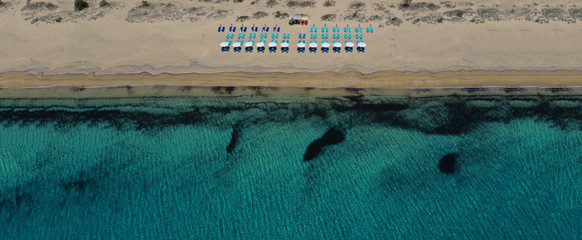 Aerial drone photo of beautiful and popular beach of Agia Anna in Naxos island, Cyclades, Greece - obrazy, fototapety, plakaty