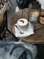 cup of coffee on wooden table