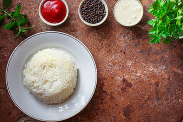 rice boiled (porridge of round-grain rice, main course) menu concept. food background. top view....