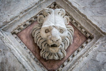 Architectural details of building facades in Siena, Tuscany, Italy