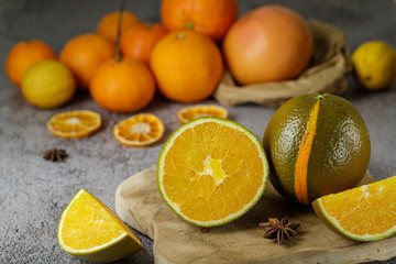 Fresh sweet green oranges  for winter desserts on wooden board