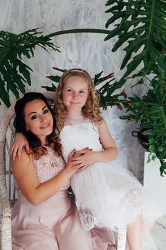 Mom with little girl in white love family dresses