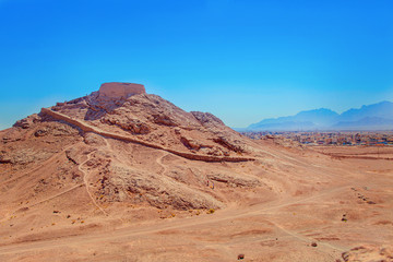 Naklejka premium Dahma - the funeral tower of the Zoroastrians. Tower of silence. Iran. Property of ancient Persia.