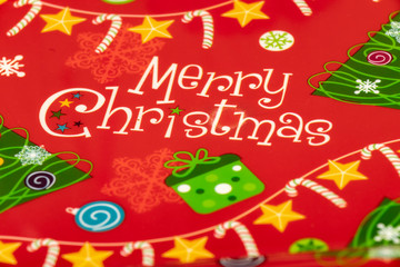Merry Christmas inscription on red new year background