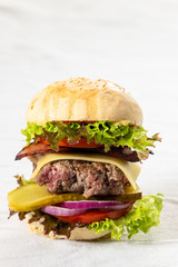 closeup of a single cheeseburger