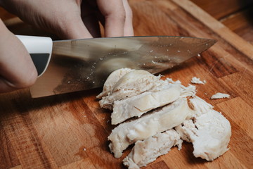 Fototapeta na wymiar slicing chicken