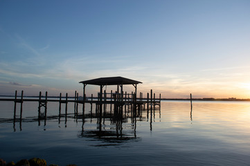 Fototapeta na wymiar Sunsets on Water