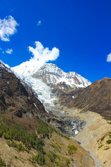 Fototapeta na wymiar Snowy mountains of Nepal on a background of blue sky. sunny day