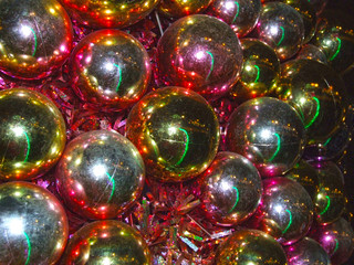 great new year holiday background of many bright colored glass balls