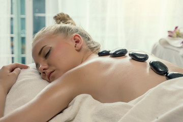   Health, beauty, resort and relaxation concept.young female having aromatherapy massage and ...