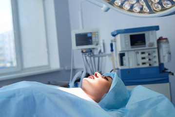 Man surgeon at work in operating room