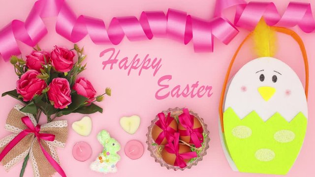 Happy Easter title appear on pink background with Easter decoration -Stop motion 