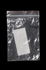 glossy polyethylene zip lock on a dark background