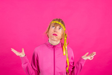 woman with desperate and furious measuring tape with slimming and losing weight