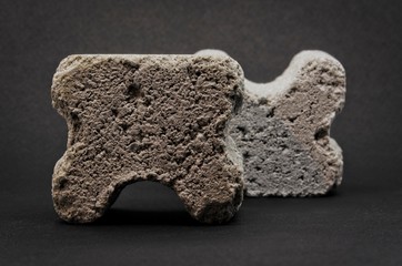 grey concrete spacers isolated on black background