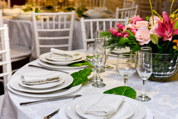 Elegant table setting with flowers and cups, natural flowers
