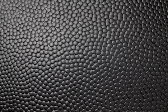 Close-up of black basketball texture
