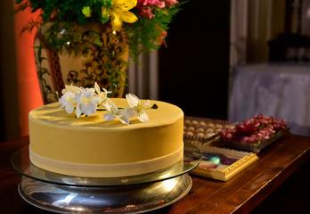 festive table setting with cake and flowers