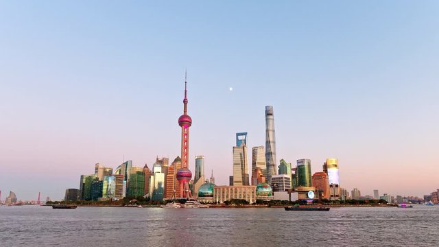 beautiful Shanghai Cityscape with blue sky background in sunset, 4k footage, time lapse video.