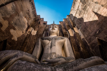 Background Unseen tourist attractions in Thailand (Big Buddha statue in Wat Si Chum) in Sukhothai province, tourists always come to see the beauty.