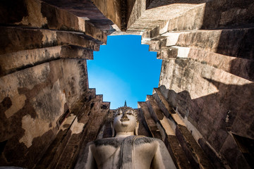 Background Unseen tourist attractions in Thailand (Big Buddha statue in Wat Si Chum) in Sukhothai province, tourists always come to see the beauty.